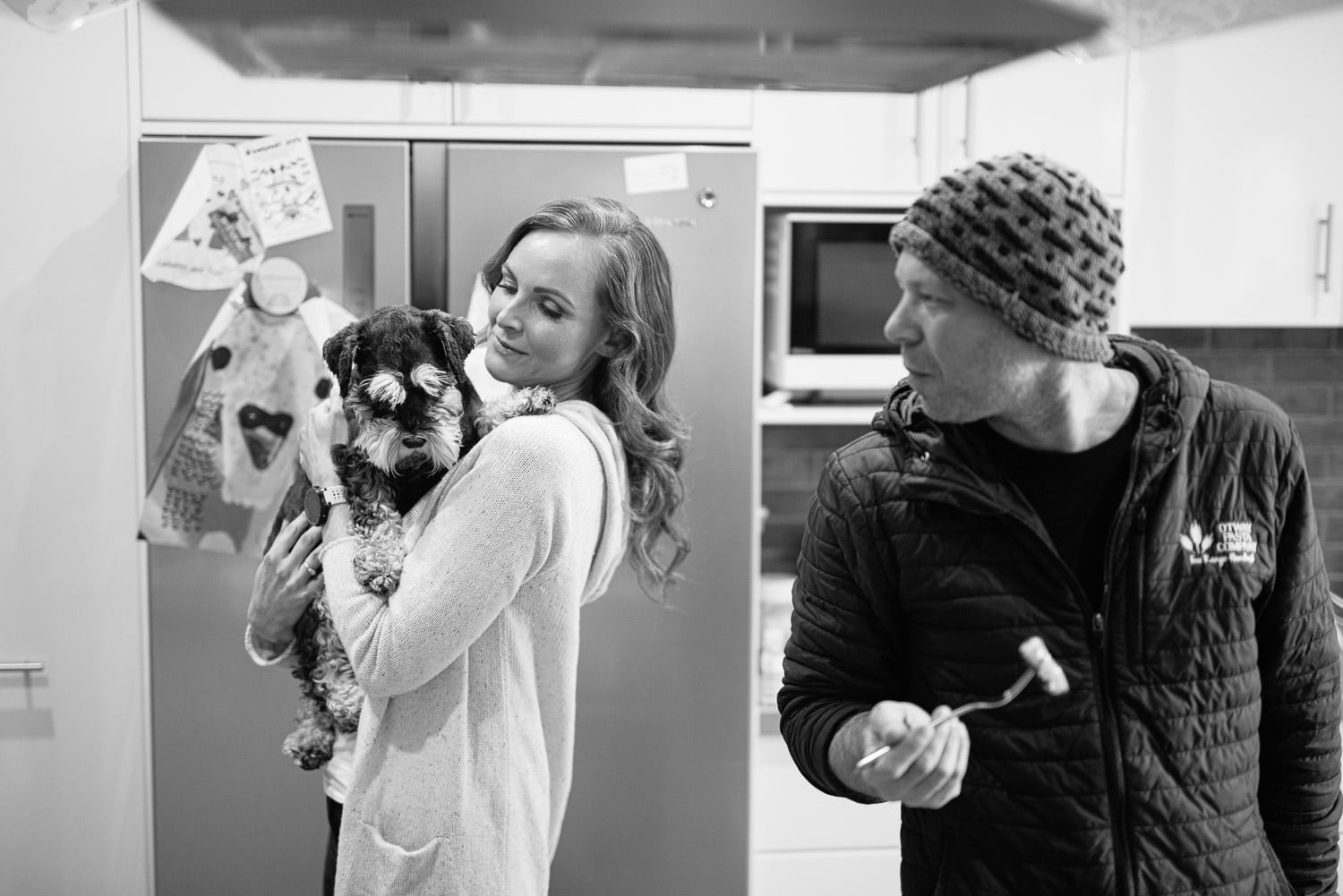 Couple getting ready with their dog before their wedding in the Otways