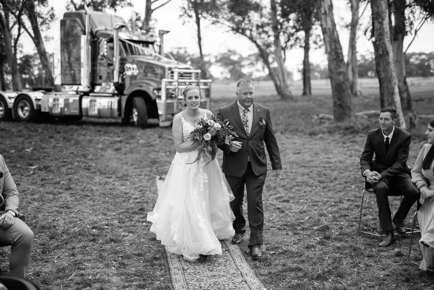 Bride walks down aisle with her father