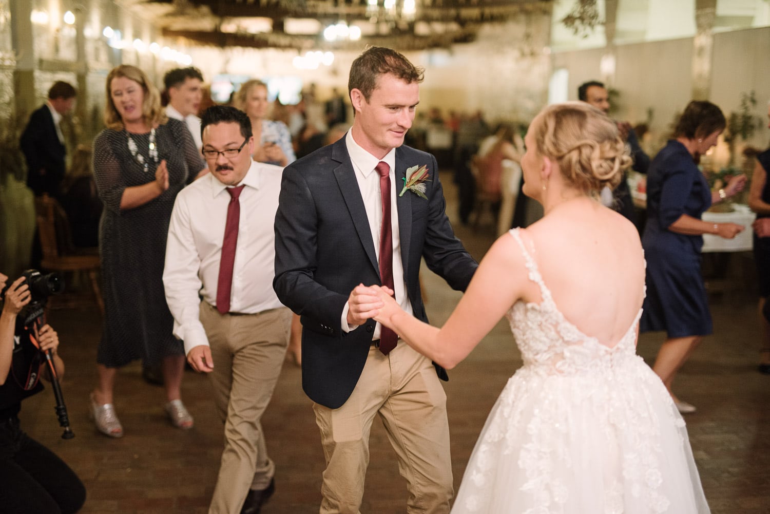 Bride and groom dancing at Moloney Rooms Warrnambool