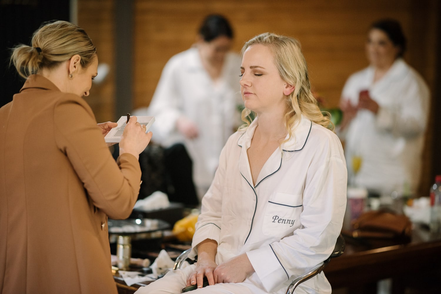 Bride getting makeup done