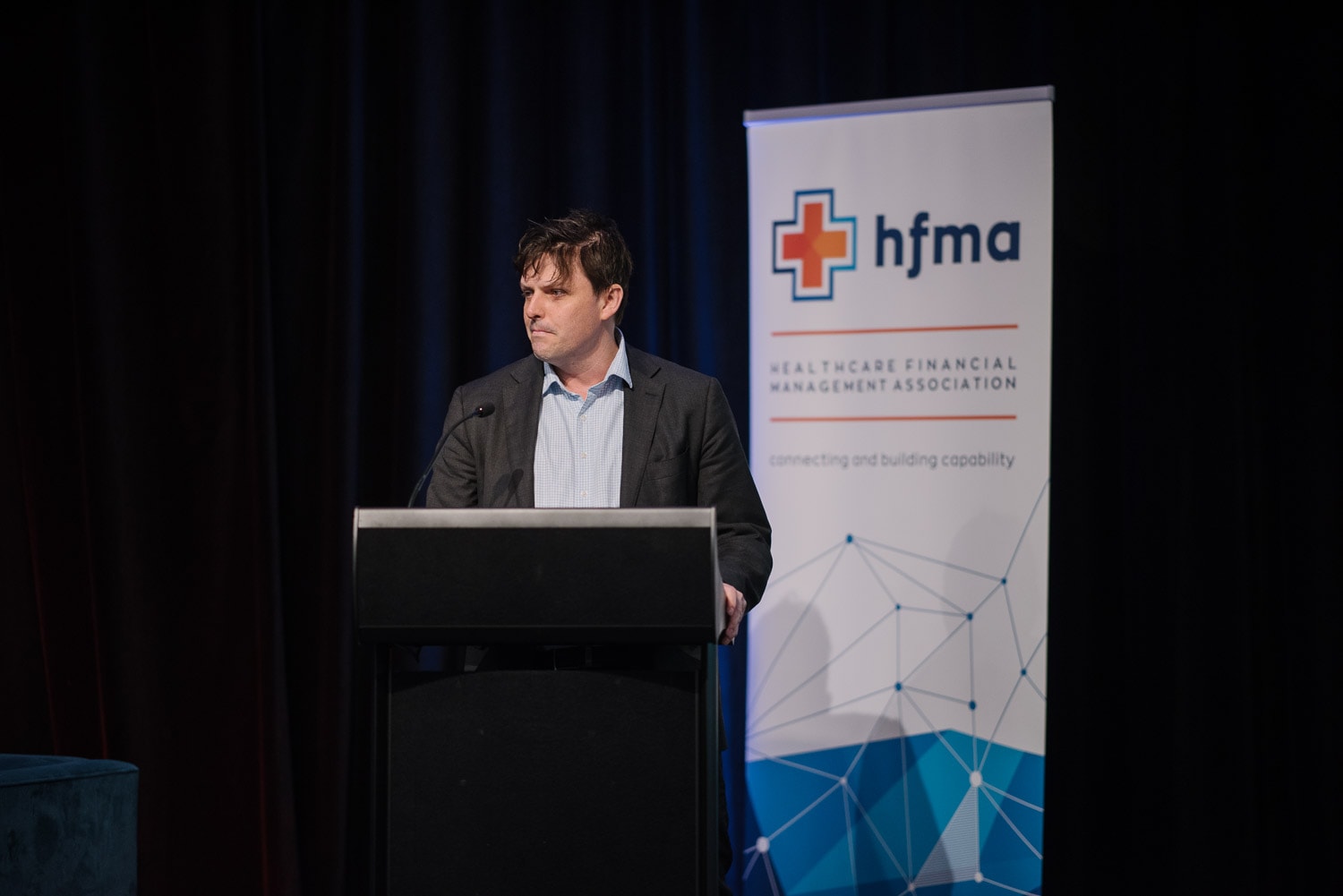 Murray Brown speaking at a health conference in Lorne
