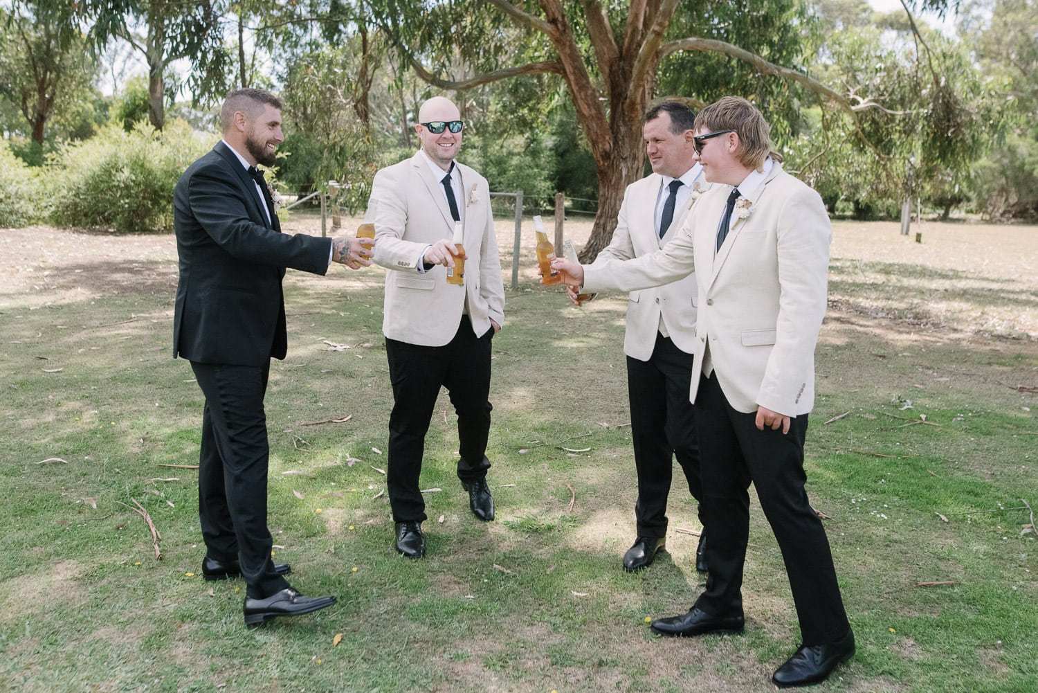 Groomsmen drinking beer