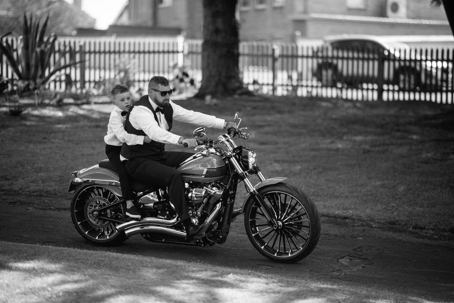 Groom riding Harley Davidson