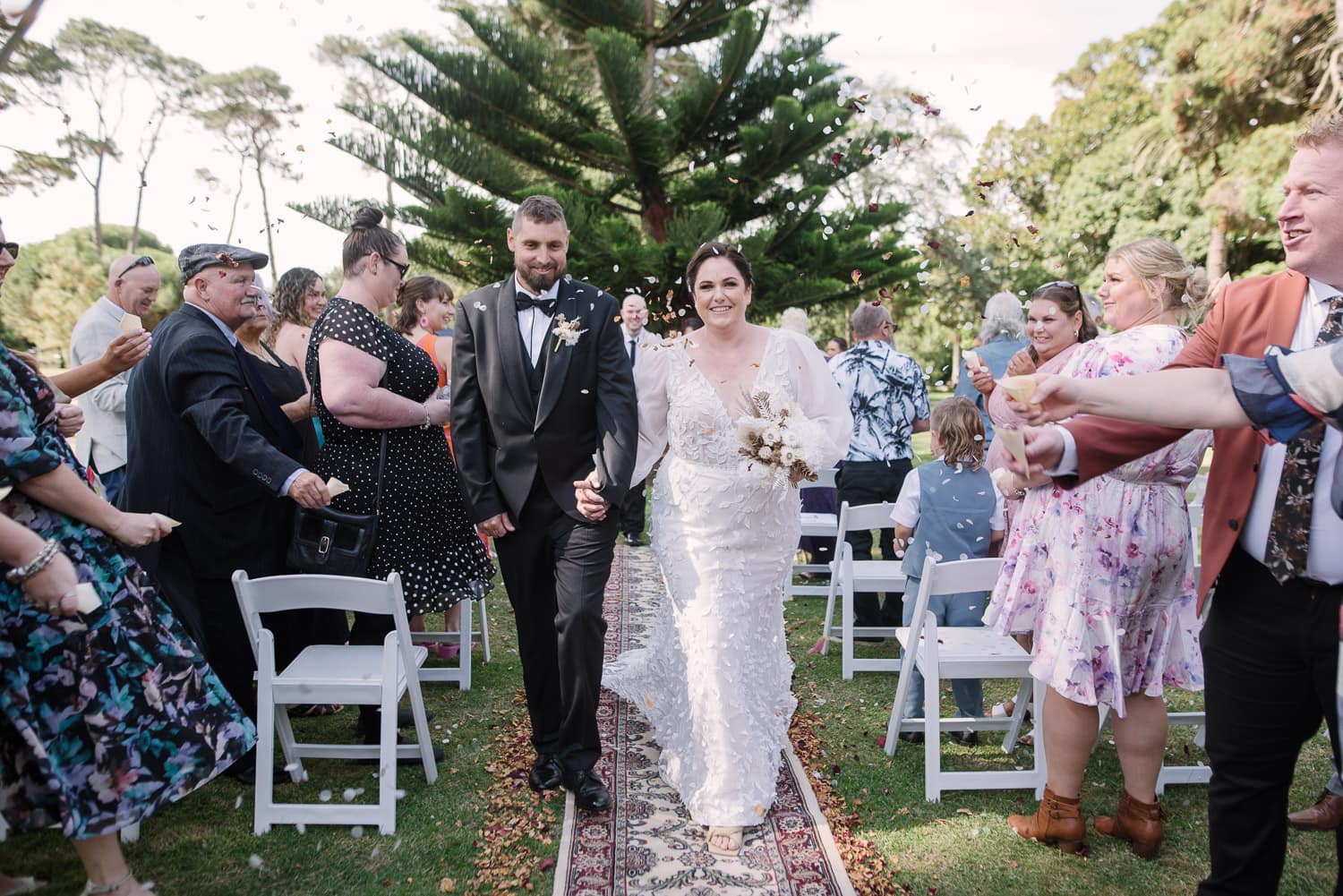 Confetti and recessional at a Warrnambool botanic gardens wedding